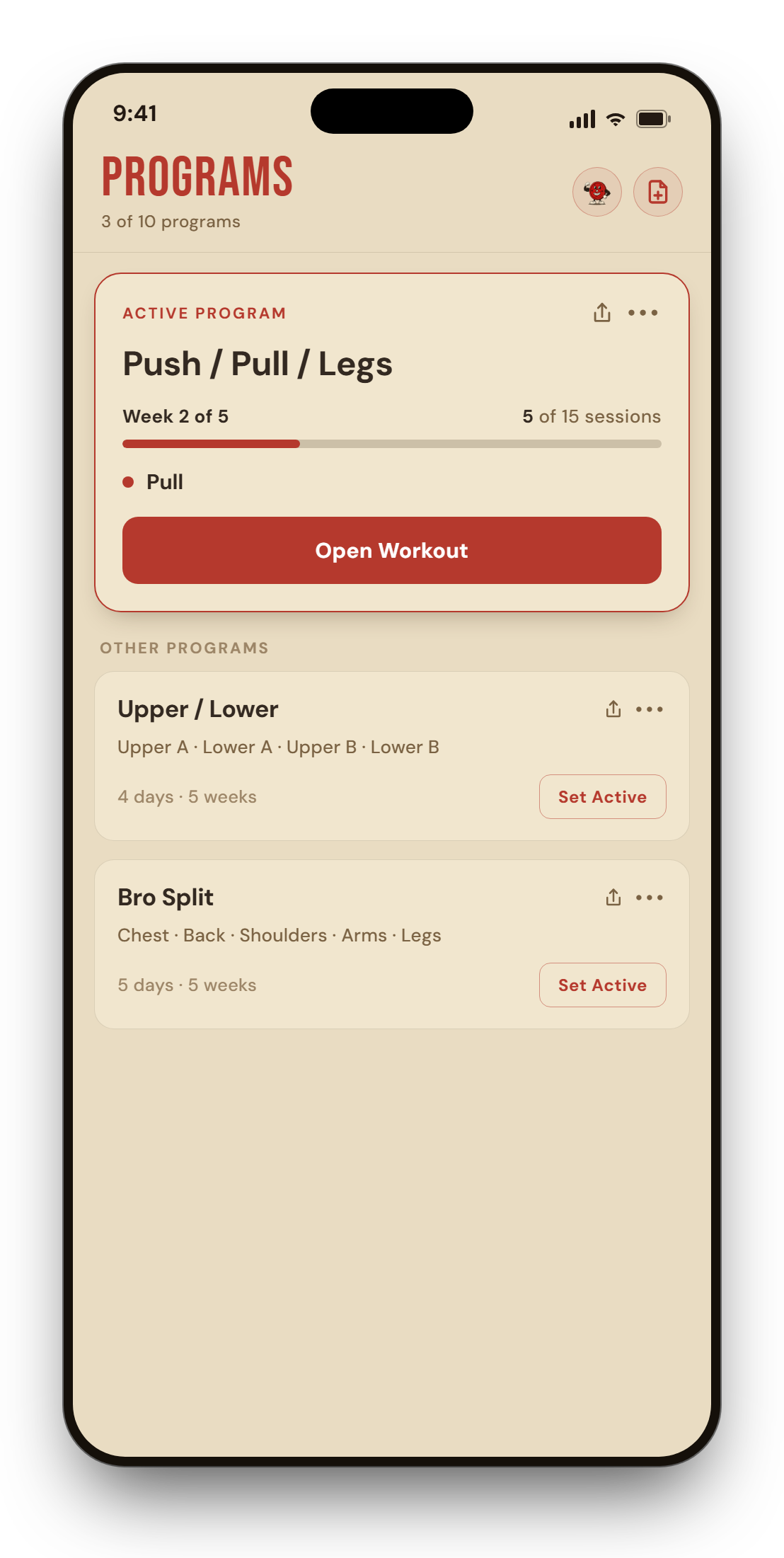 The program list showing an active Push / Pull / Legs program at Week 2 of 5, an Open Workout button, and other training splits listed below.